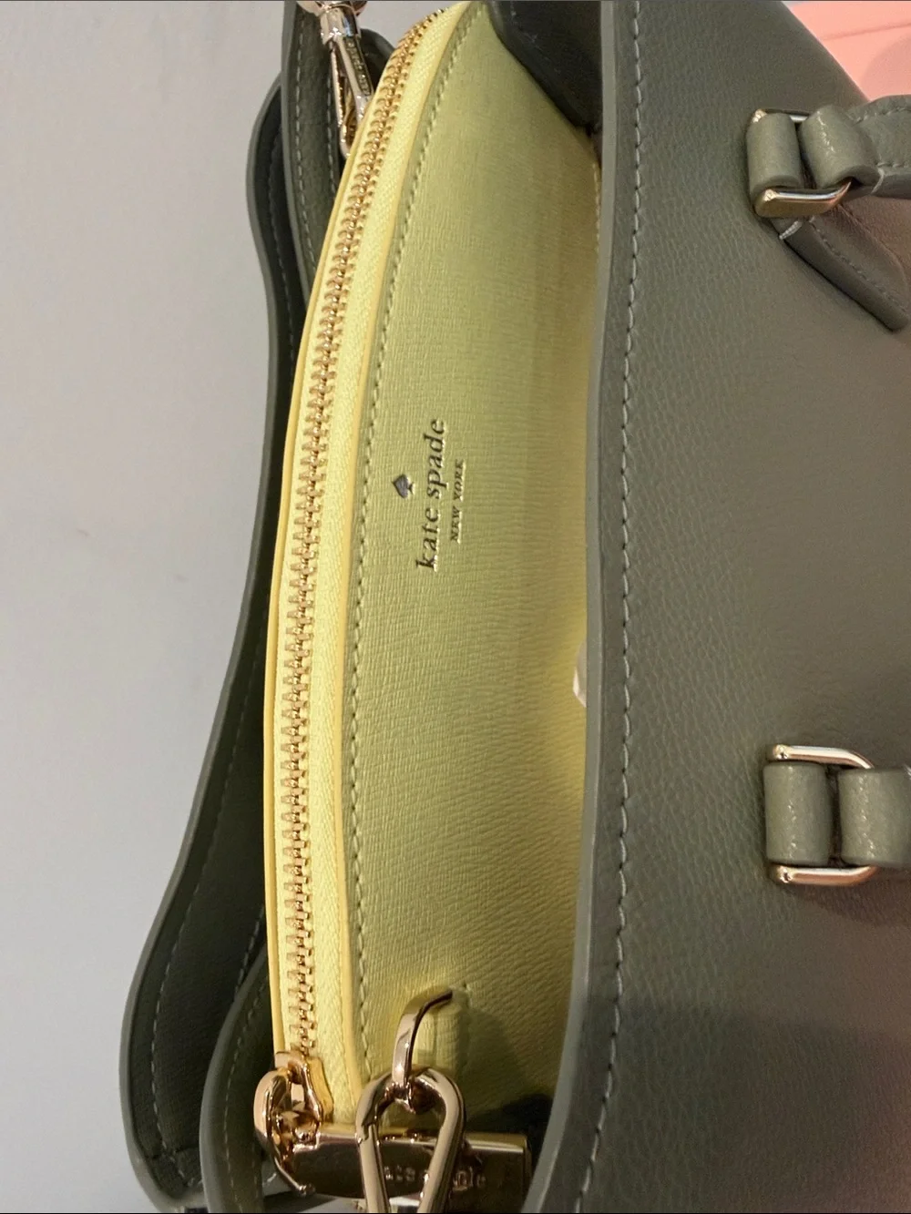 kate spade olive green leather satchel with yellow interior trim